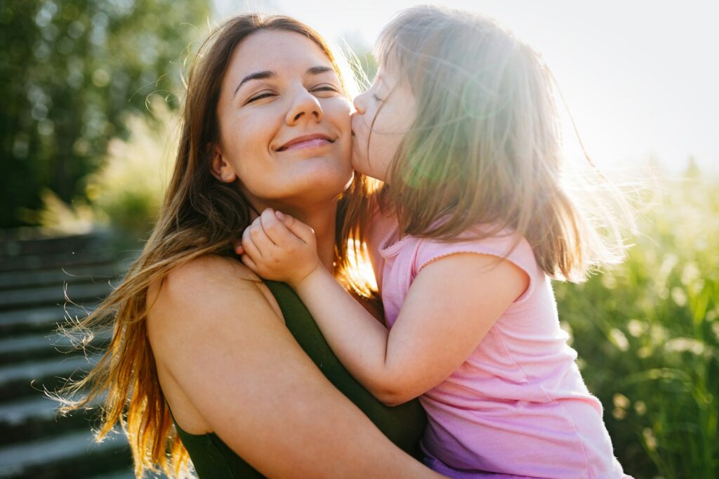 Little girl with special needs enjoy spending time with mother